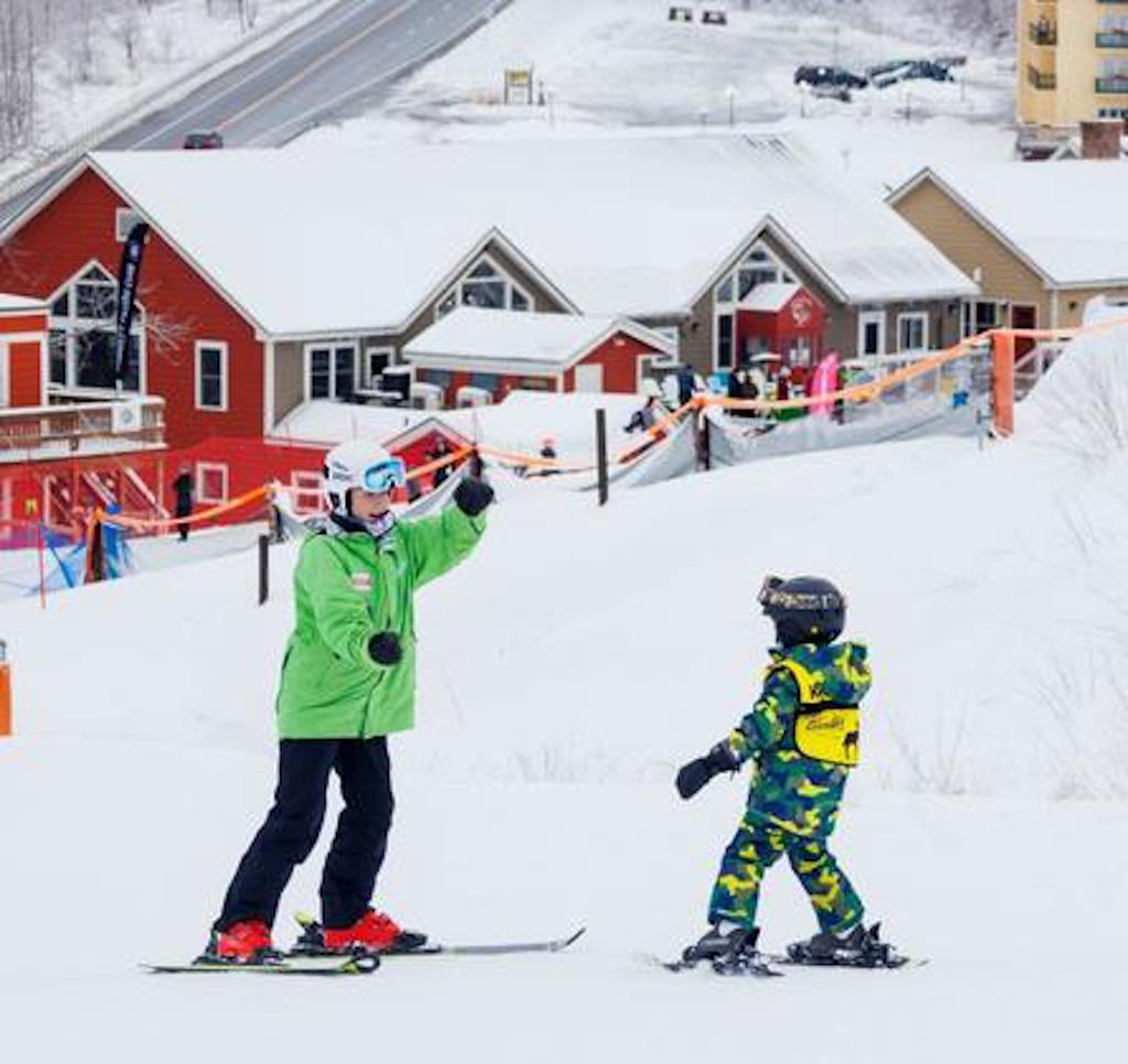 bromley instructor teaching child how to ski